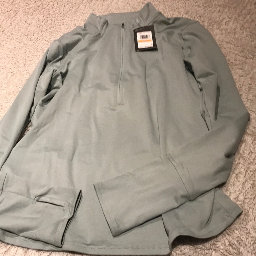 Woman’s  size small underarmour zip workout shirt. I have others posted.